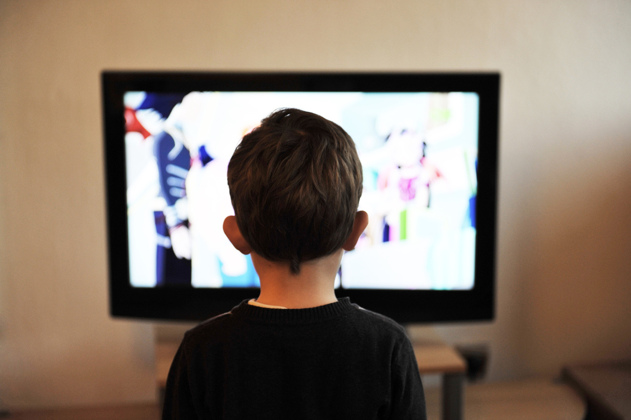 Kid Looking at a Television